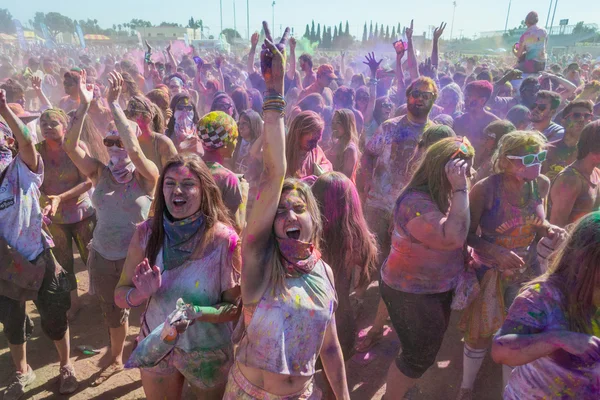 People celebrating Holi Festival of Colors.