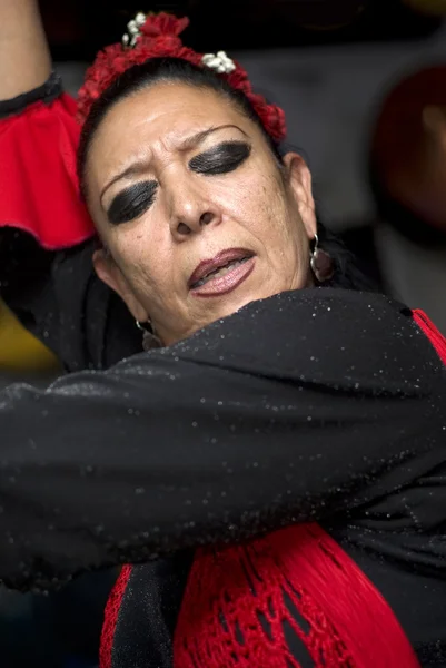 Hispanic woman flamenco dancing