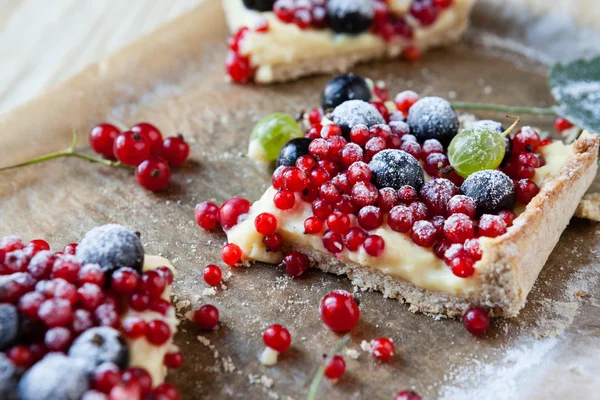 Slices pie with summer berries