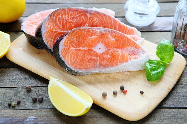 Fresh salmon fillet on a board