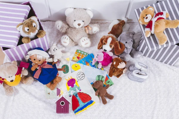 Stuffed animal toys in interior room