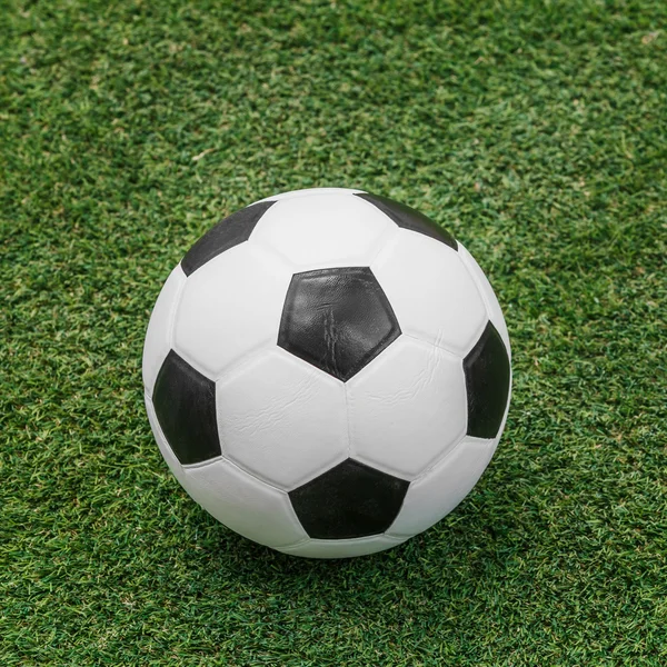 Soccer ball on artificial turf