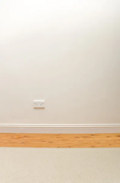 Blank cream wall with power point