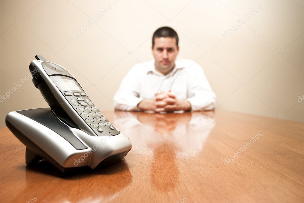 depositphotos_19312713-stock-photo-man-waits-for-a-call.jpg
