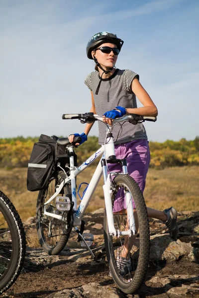 Young woman biking