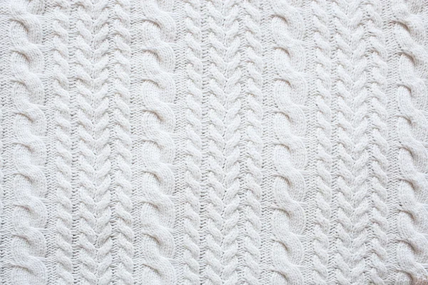 White knitted woolen background