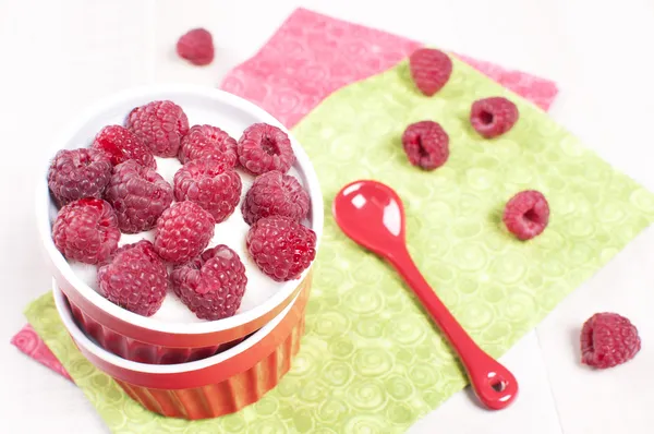Fresh raspberry with cream or yogurt dessert