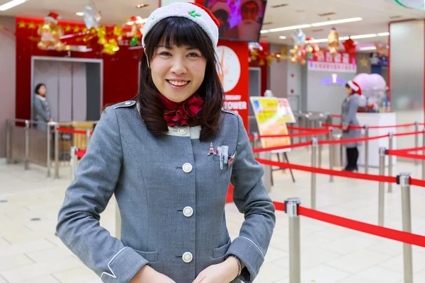 TOKYO, JAPAN - NOVEMBER 25: Tokyo Tower's female officer in Toky