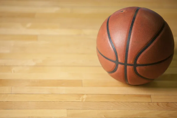 Basketball ball on the court floor