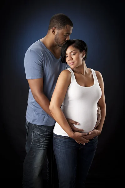 Image of african american man and pregnant woman