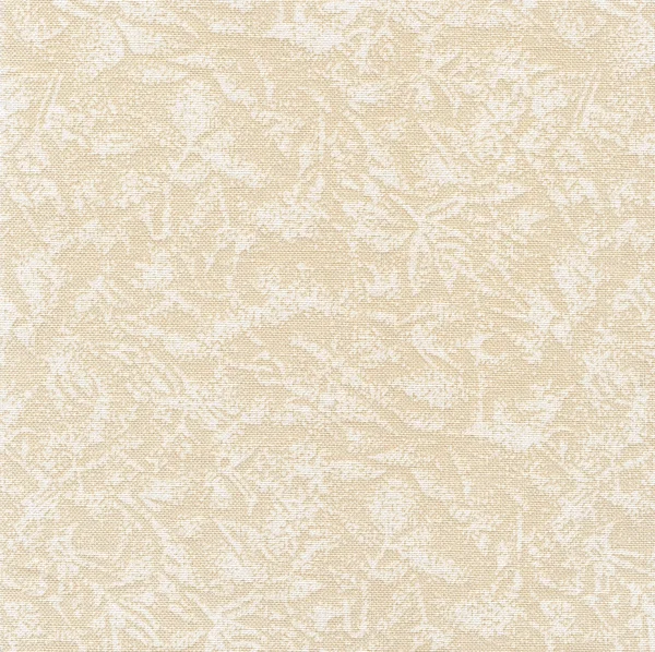 A high resolution neutral beige fabric with a subtle white floral pattern