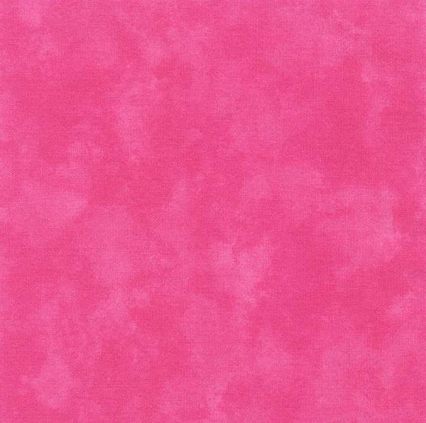 A high resolution bright pink or fuschia fabric that looks like tie dye or paint