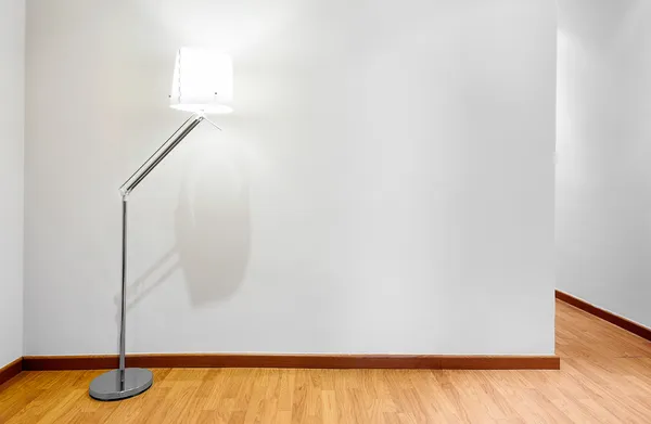 Empty wall with compy space and lamp