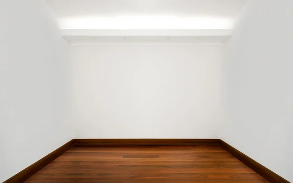 Empty white room with wooden floor