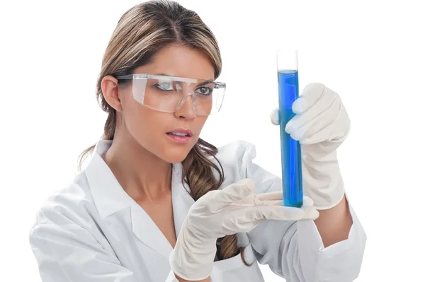 Young woman doctor holding test tube