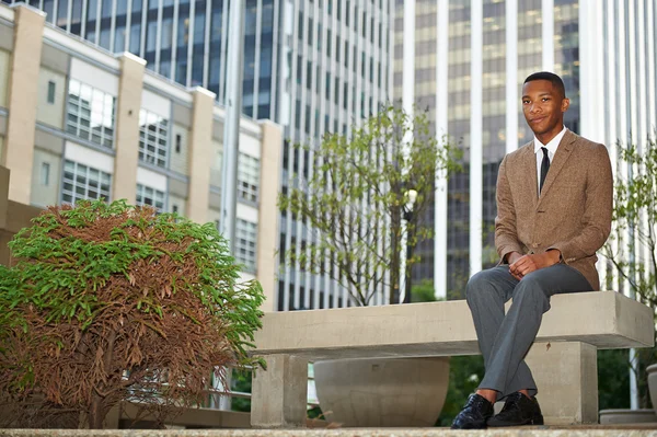 Young successful black business man in the city