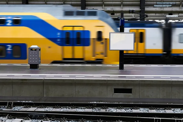 Empty blank billboard at train station