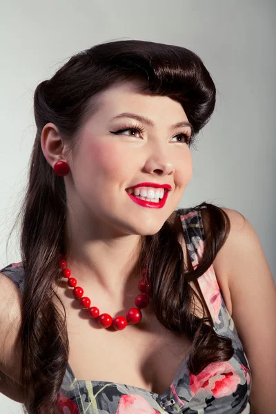 Pin-up girl with red beads