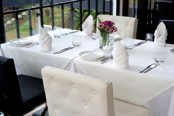 Contemporary Elegant black and white restaurant tables