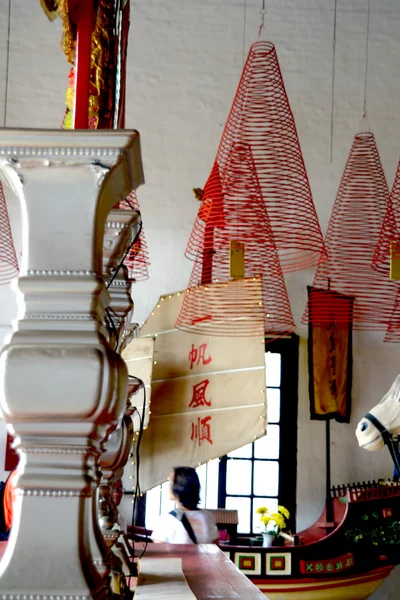 Joss sticks in Chinese temple in Hoi An, Vietnam