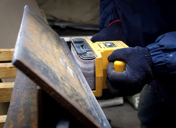 Welder on the industrial workplace