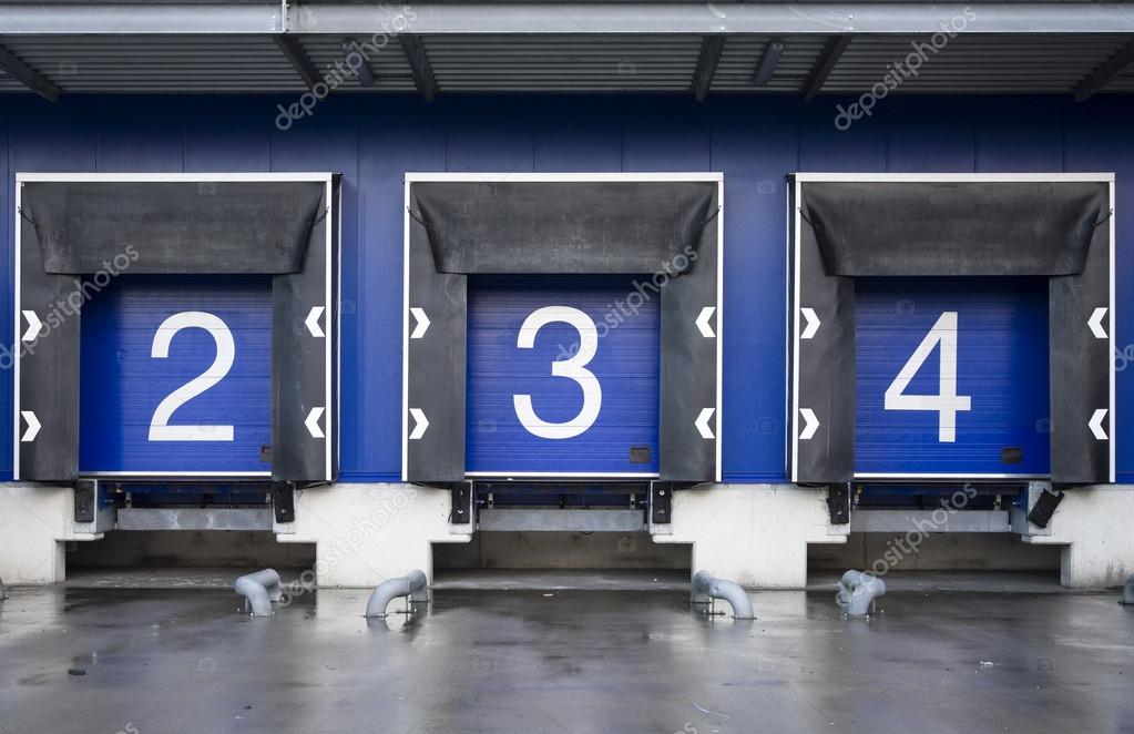 Loading bay with numbers for loading and unloading trucks — Stock Photo
