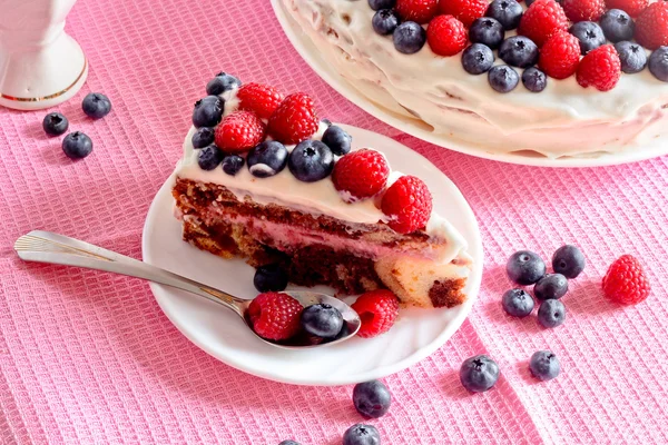 Creamy sweet cake with chocolate and cream
