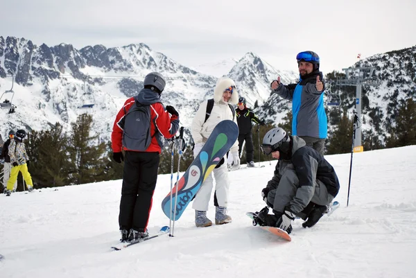 Group of young people on the mountain top Todorka Bansko ski resort in Bulgaria