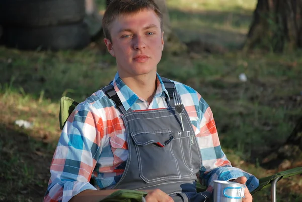 Young people and nature. Camping in the woods by the lake in Konakovo