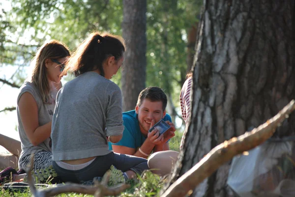 Young people and nature. Camping in the woods by the lake in Konakovo