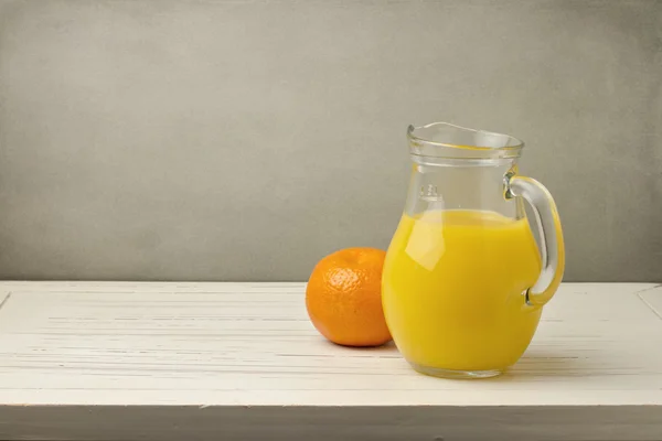 Orange juice with fresh tangerine