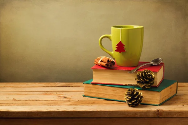 Christmas tea mug on books