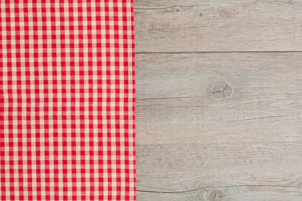 Table with red checked tablecloth.