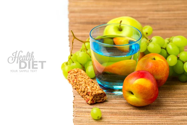 Water, healthy snack bar and fruits