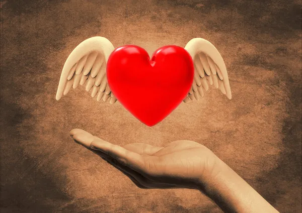 Winged heart in hand