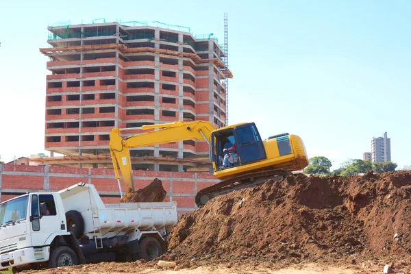 Excavation Machine Loading Soil In Dumper Truck