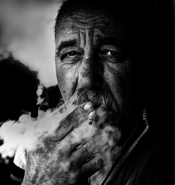 Old man smoking