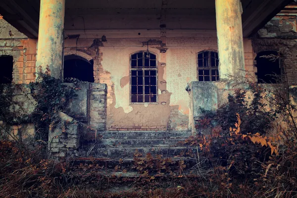 Vintage photo of abandonded old castle entrance
