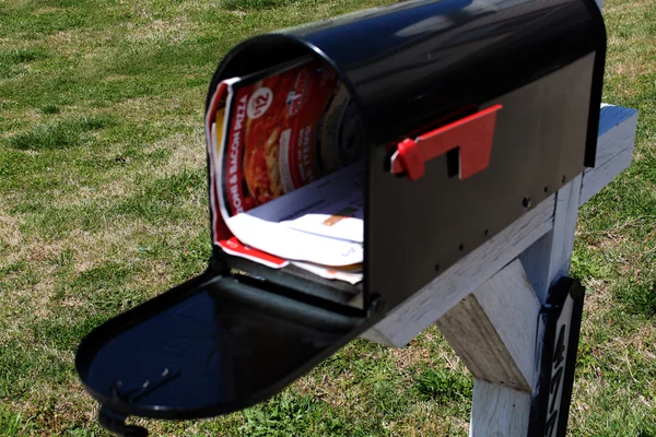 Junk Mail in Mailbox