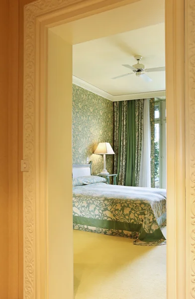 Interior luxury apartment, comfortable bedroom, view from corridor