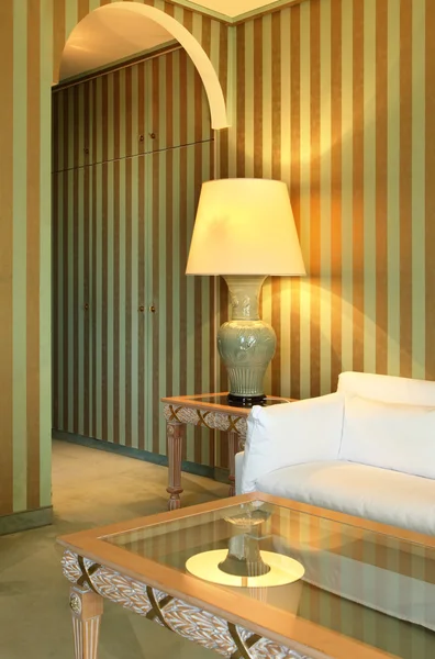 Interior luxury apartment, comfortable suit, closeup table lamp