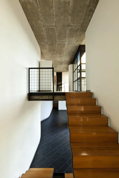 Interior modern villa, wooden staircase