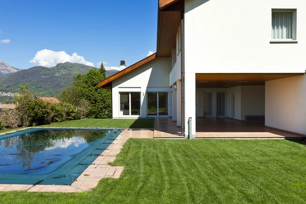 House and pool, exterior, summer day