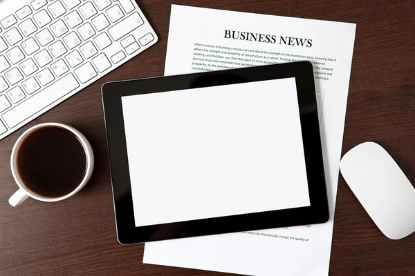 Tablet on the table of a businessman