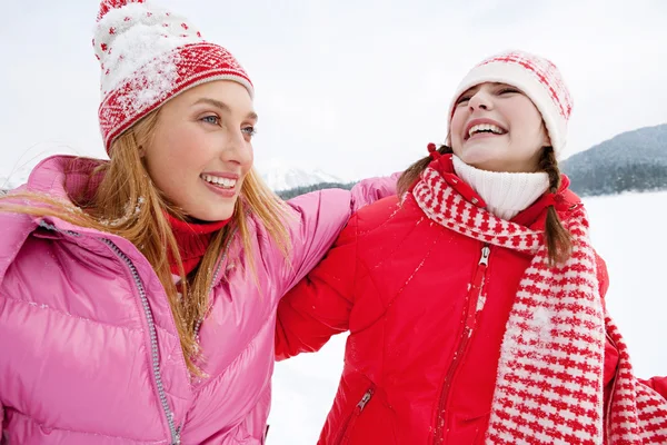 Two young women in winter outdoors