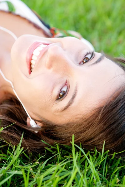 Woman laying on grass