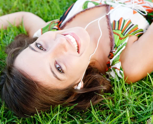 Woman laying on grass