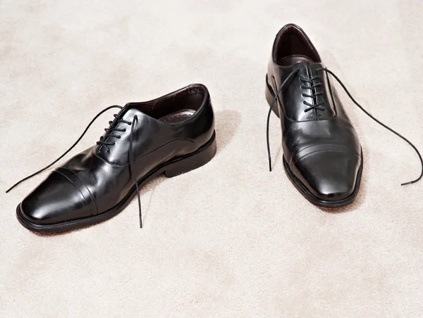 Pair of black leather businessman shoes
