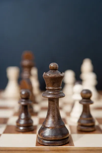Queen chess dark wooden piece