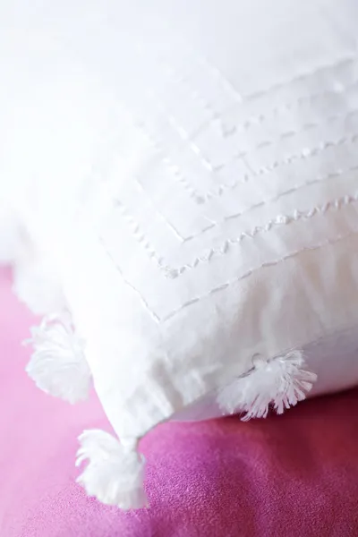 White and pink cushion